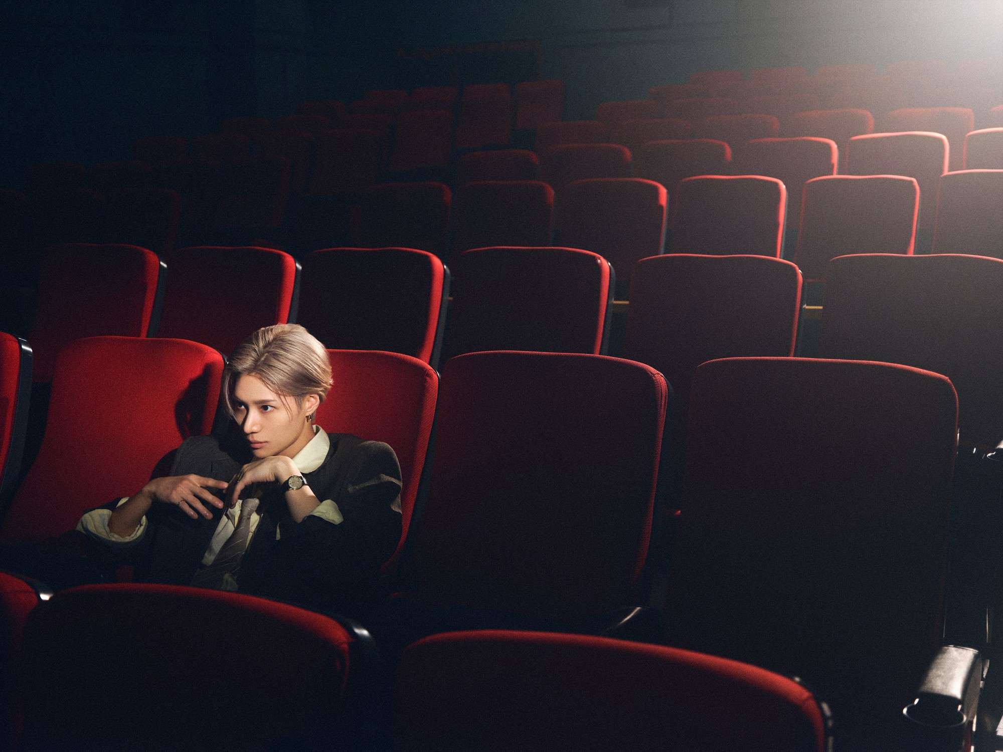 TAEMIN alone in an empty theatre